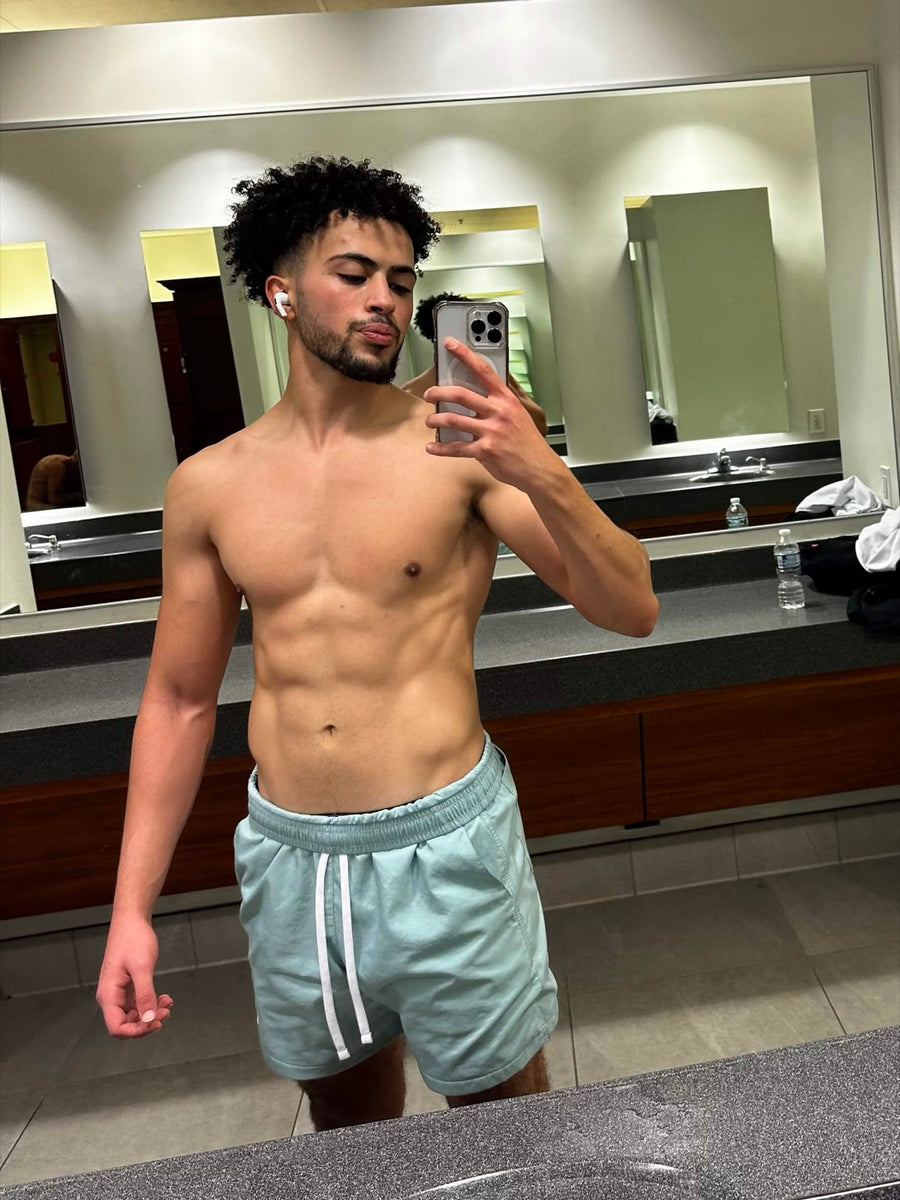 Client before and after photos showing added muscle