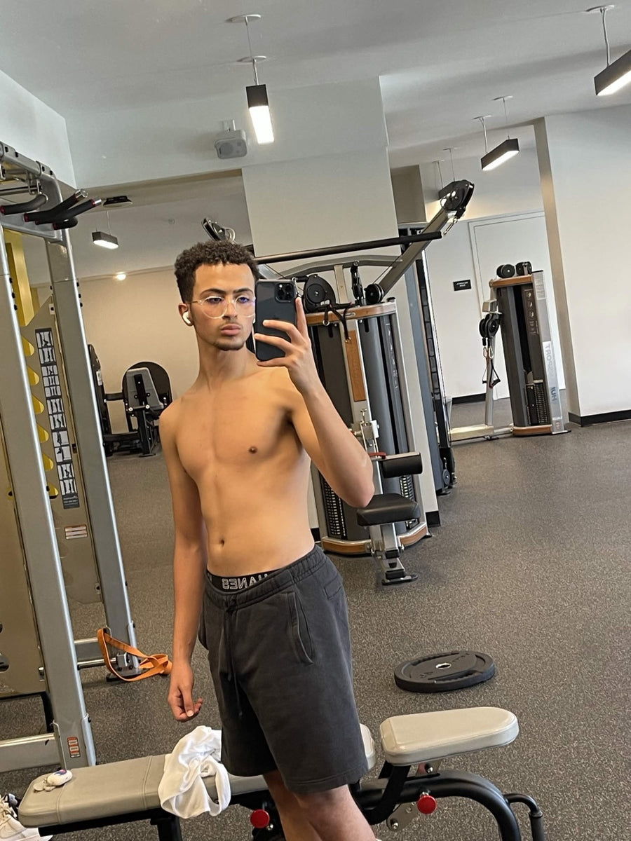 Client before and after photos showing added muscle